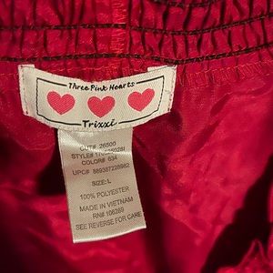 Red Blouse. Polyester satin feel. No stretch.